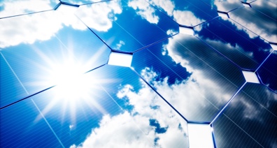 Blue sky reflected off of solar panels