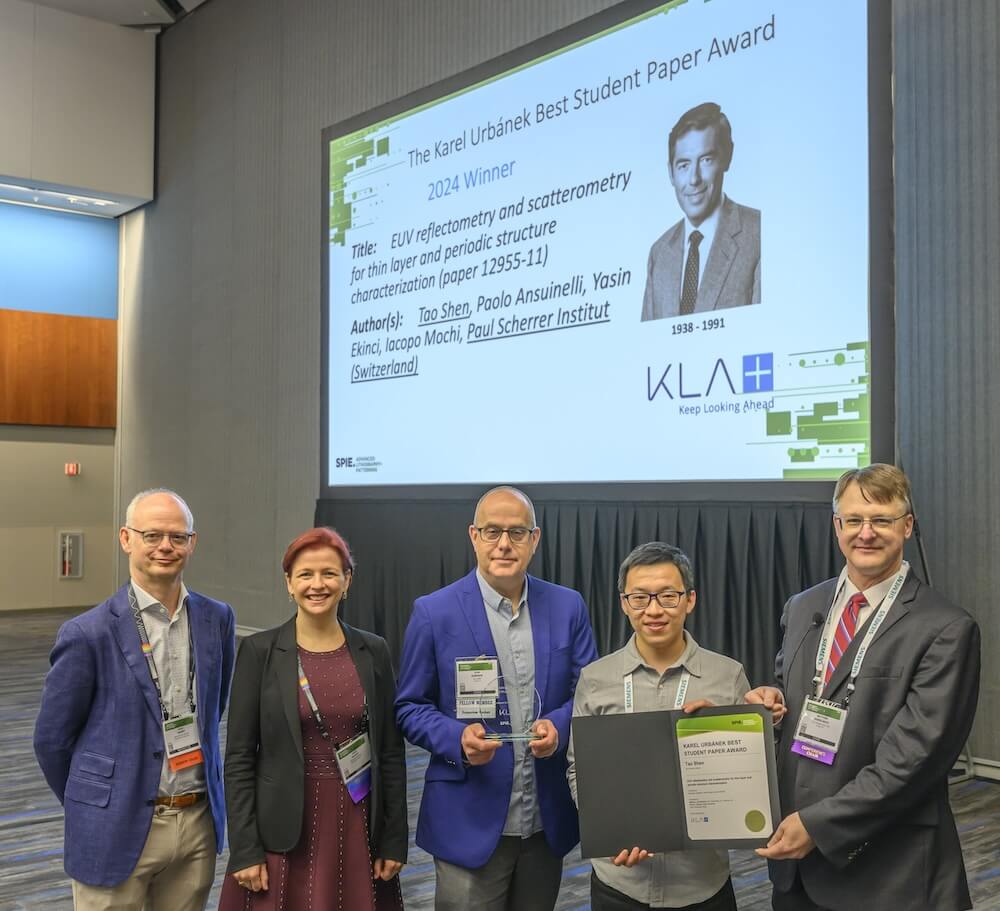 KLA's John Robinson presents Karel Urbánek Best Student Paper Award at the 2024 SPIE Advanced Lithography + Patterning Symposium. 