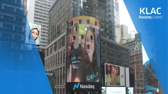 Picture of KLA employee on building-facade in New York City during the KLA Nasdaq launch