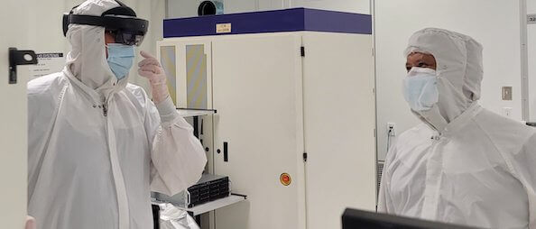 Employees learn to service KLA tools in a cleanroom in Milpitas, California.