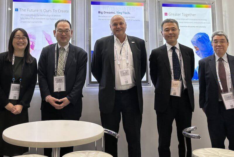 KLA and ECI Technology employees ready to greet visitors to SEMICON Japan. 